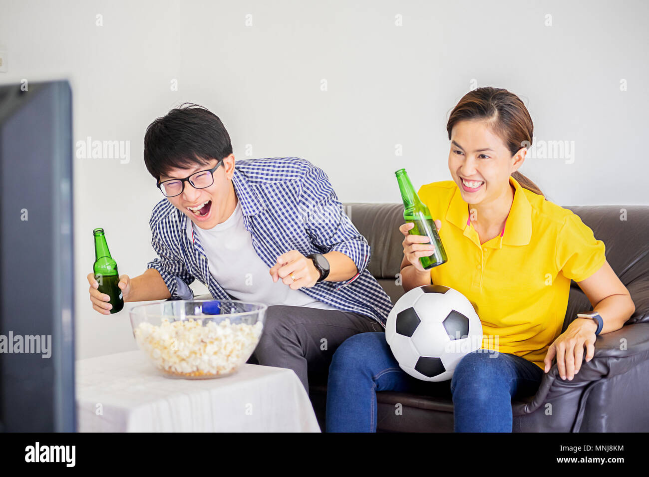 Football game tv hi-res stock photography and images