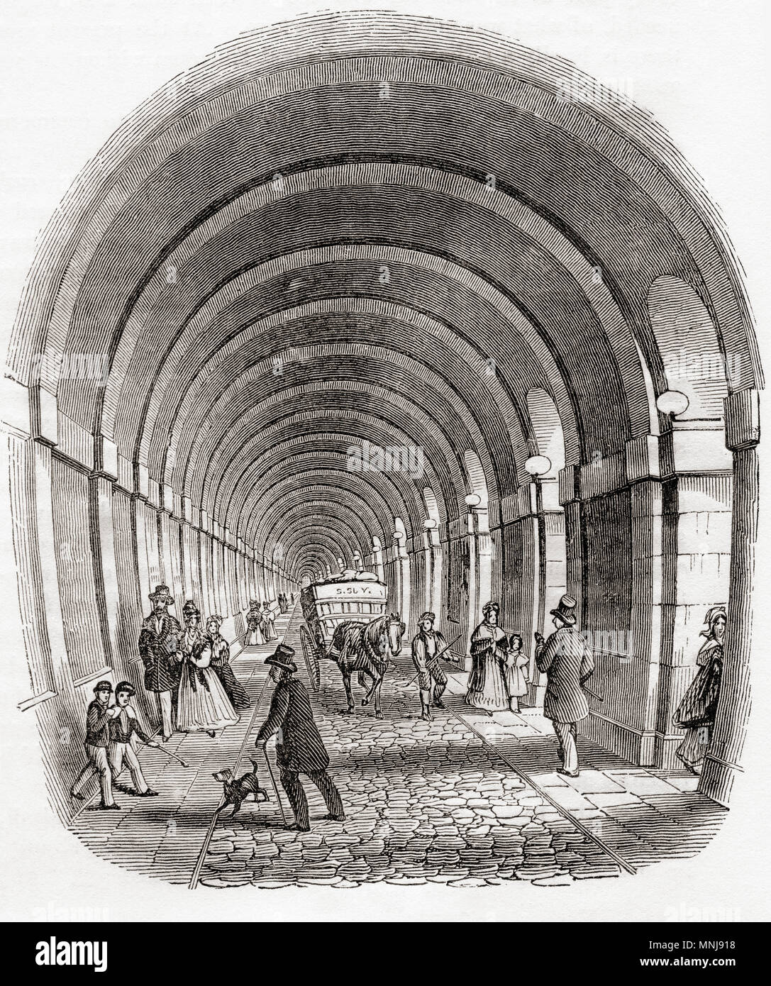 The Thames Tunnel, London, England, seen here in the early 19th century. Built beneath the River Thames in London, it connects Rotherhithe and Wapping and was the  first tunnel known to have been constructed successfully underneath a navigable river.   From Old England: A Pictorial Museum, published 1847. Stock Photo