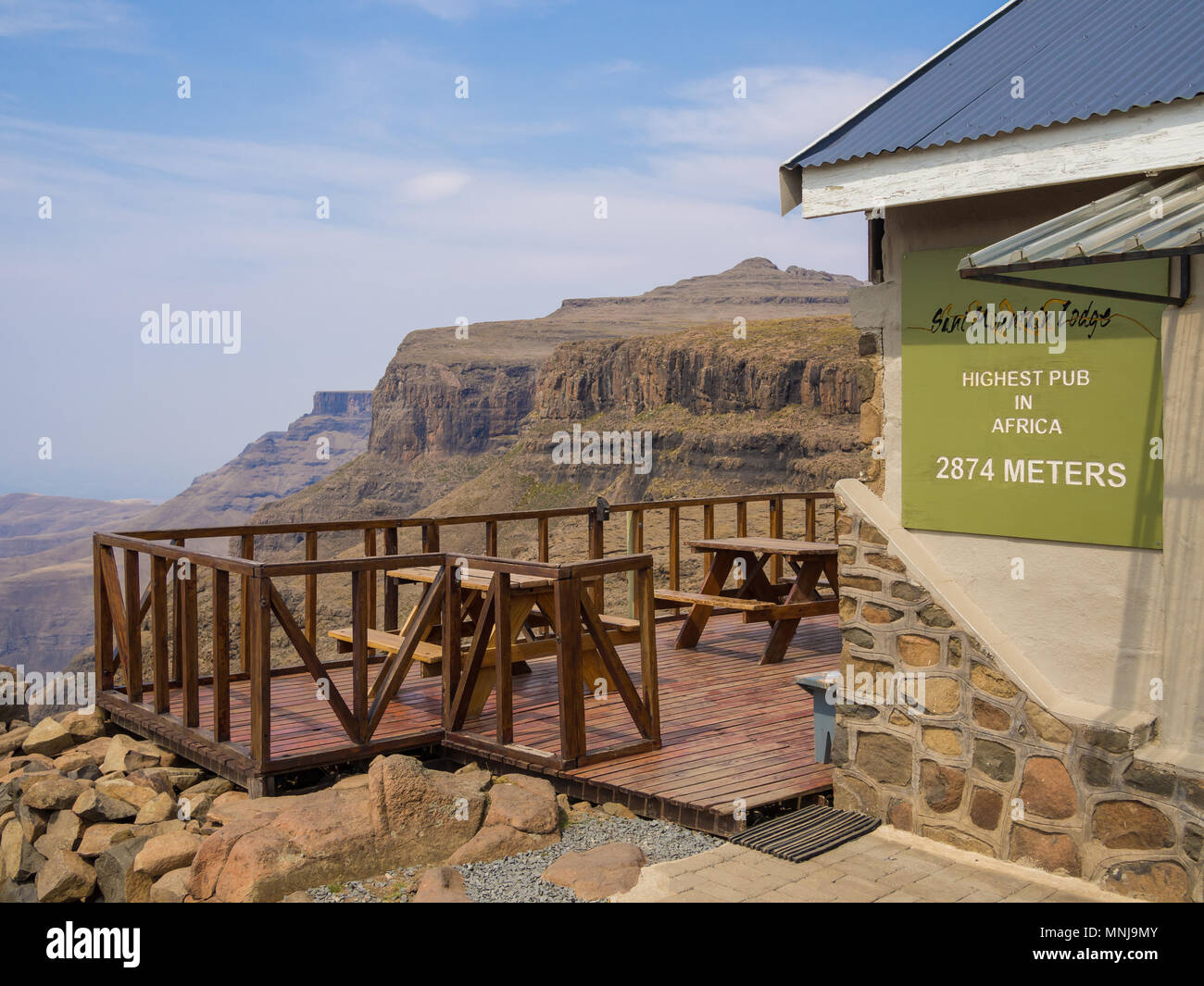 The highest pub in Africa on top of Sani Pass with balcony and mountains Stock Photo