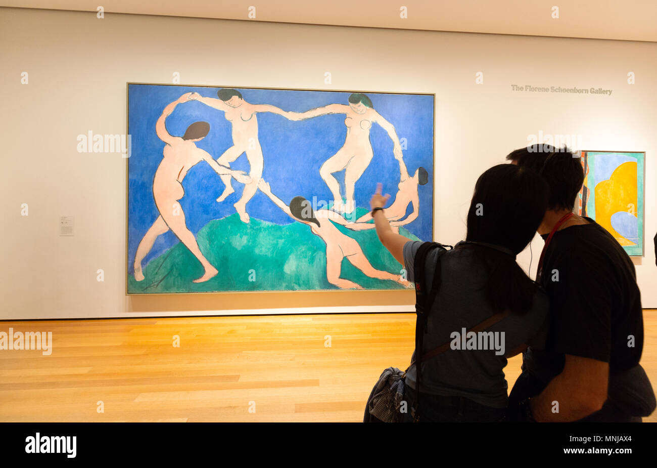 Matisse museum; A couple of visitors looking at Modern Art - a Henri Matisse painting, MoMA ( Museum of Modern Art ), New York city, USA Stock Photo
