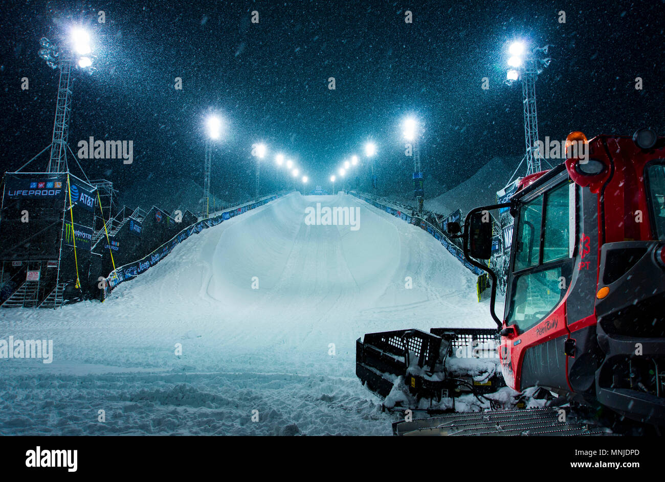 A snowcat parked at the bottom of the X-games half pipe in Aspen, Colorado Stock Photo
