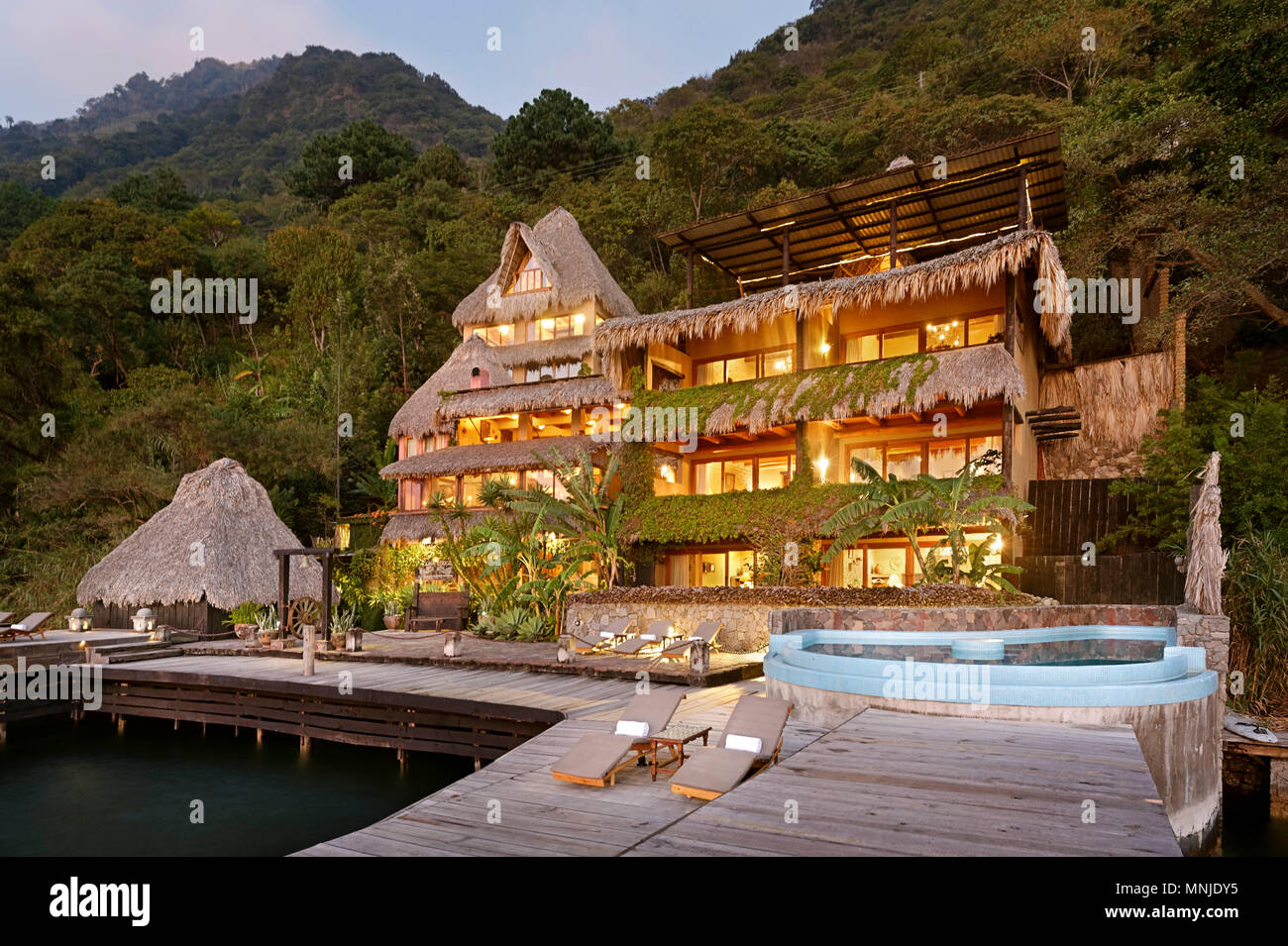 Hotel and tourist resort on shore of Lake Atitlan, Guatemala Stock Photo
