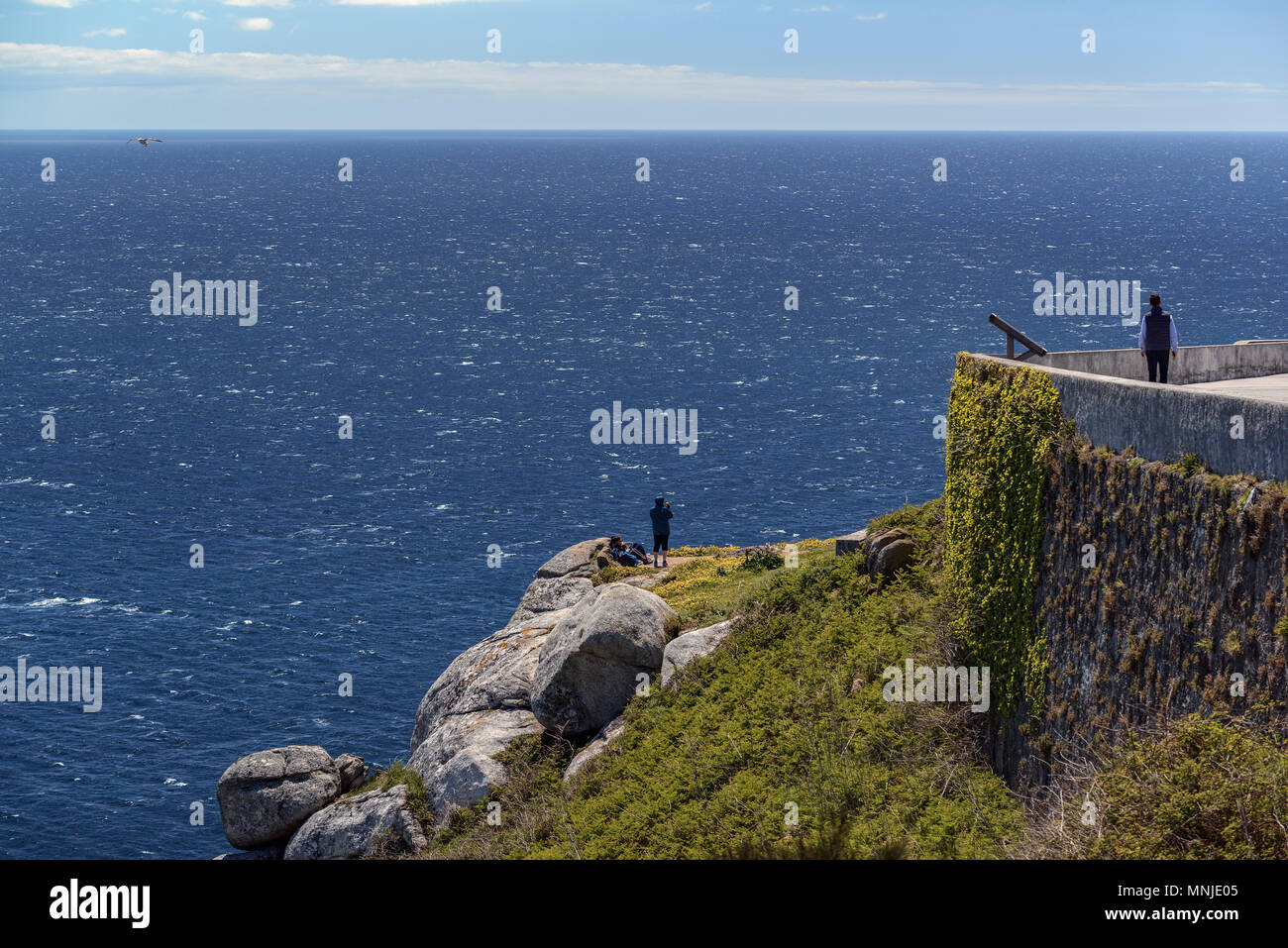Lighthouse at the End of the World at Cape Finisterre in Galicia, Fisterra, Spain Stock Photo Lighthouse at the End of the World at Cape Finisterre in Galicia, Fisterra, Spain Stock Photo