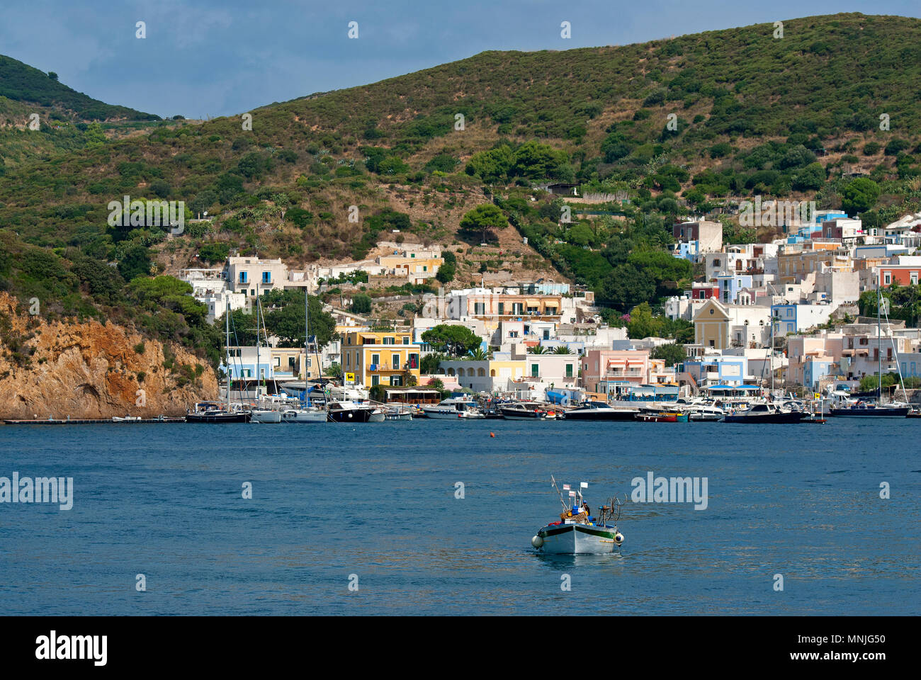 Fishing boat and Santa Maria village, Ponza Island, Lazio, Italy Stock Photo