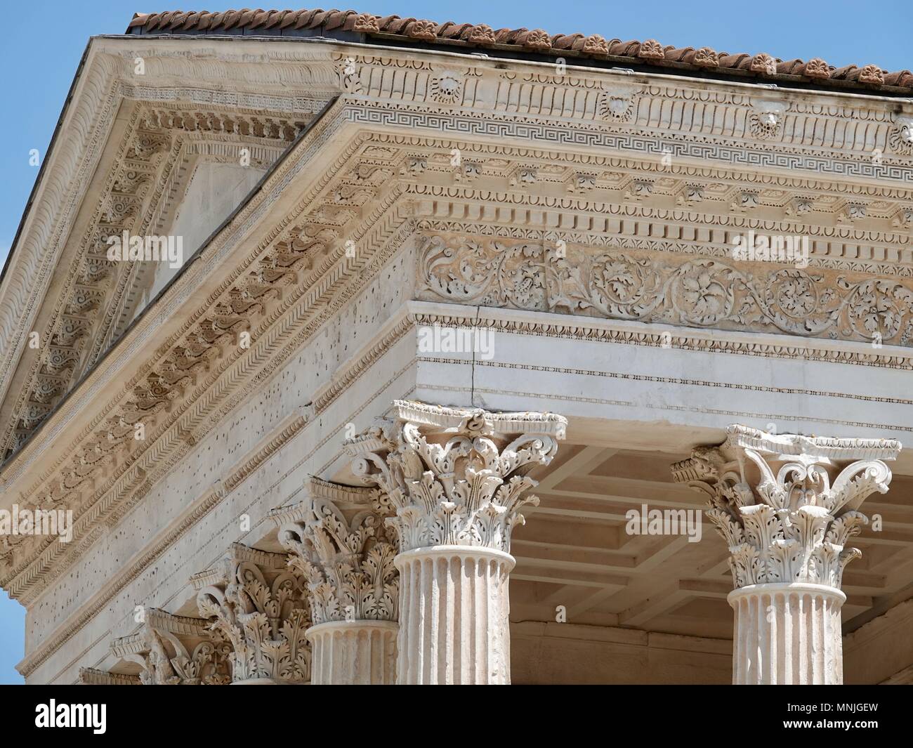 Detail of a corner of the Maison Carrée, Square House, the ancient Roman temple, Nîmes, France Stock Photo