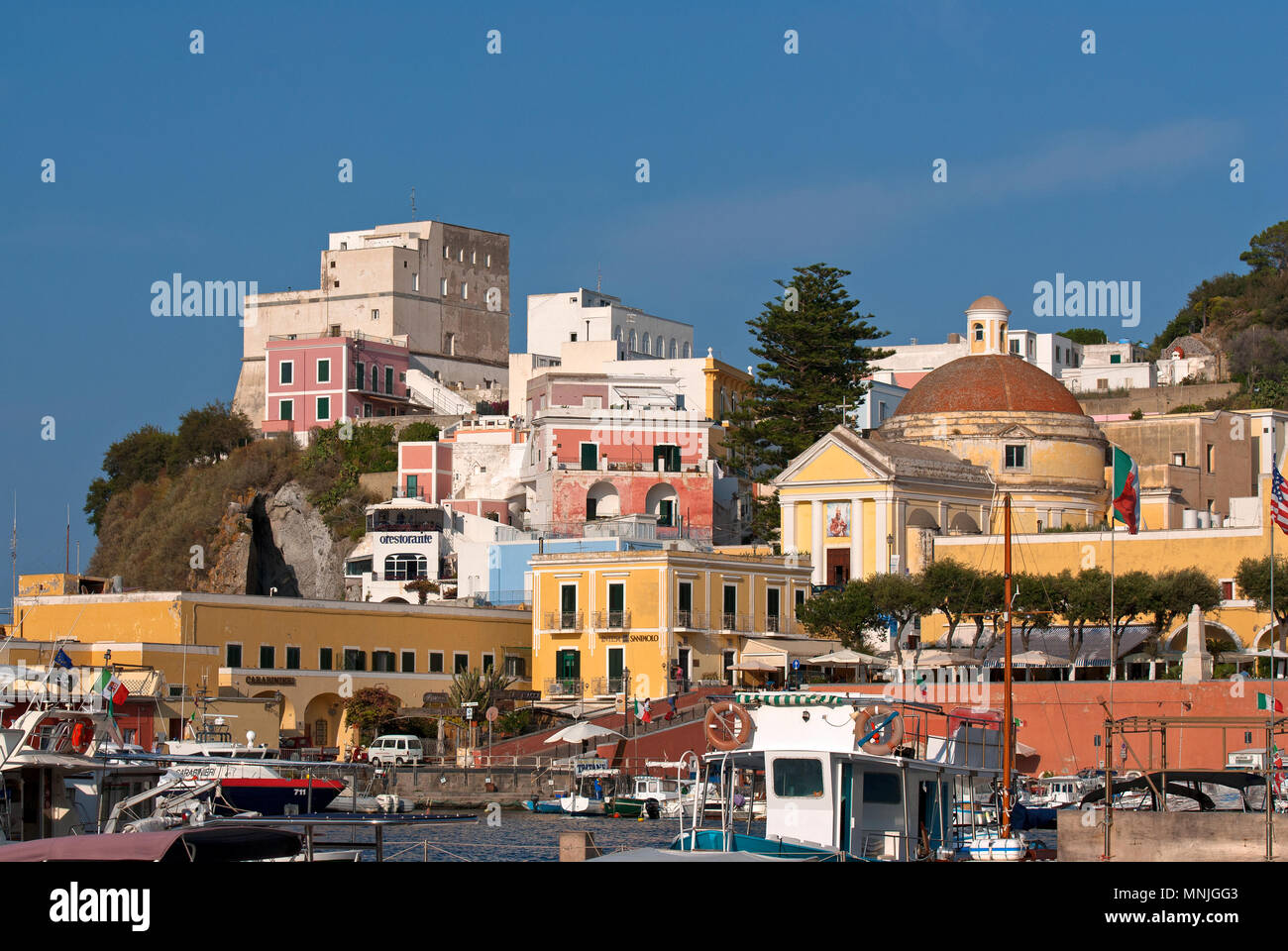 View of Ponza, on the right St Silverio and St Domitilla Church, on the left the Bourbons Tower (today used as hotel), Ponza Island, Lazio, Italy Stock Photo