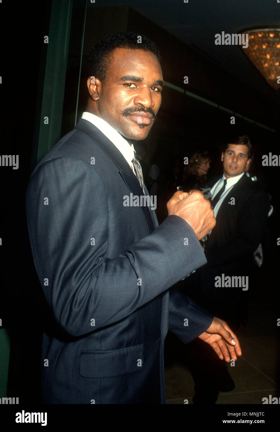 BEVERLY HILLS, CA - OCTOBER 26: Fighter Evander Holyfield attends the 1990 Carousel Ball of Hope to Benefit the Barbara Davis Center for Childhood Diabetes on October 26,1990 at the Beverly Hilton Hotel in Beverly Hills, California. Photo by Barry King/Alamy Stock Photo Stock Photo