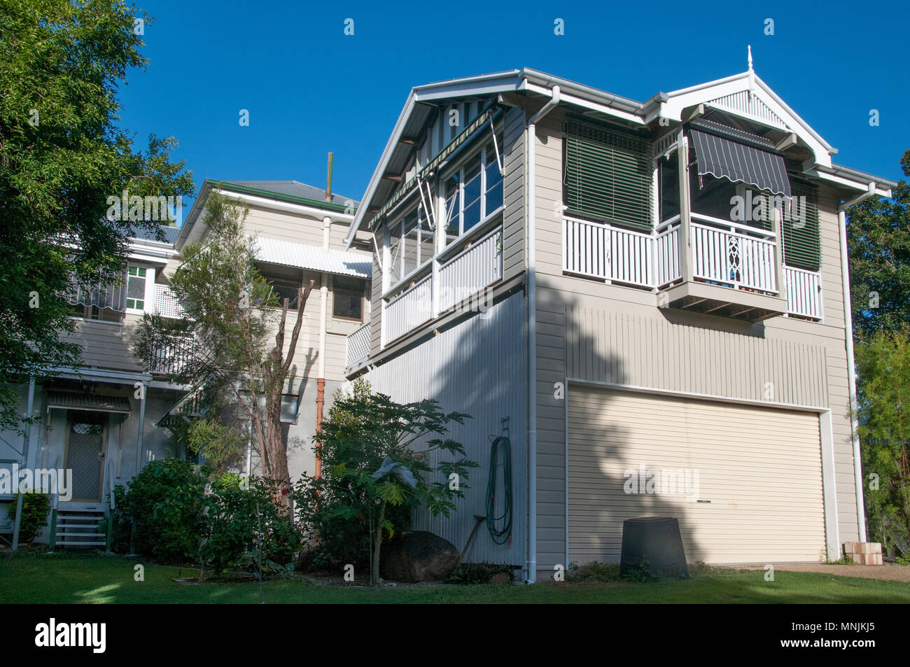 Queenslander-style Art Nouveau timber home ca. 1913, in the inner-city Brisbane  suburb of Windsor, Australia Stock Photo