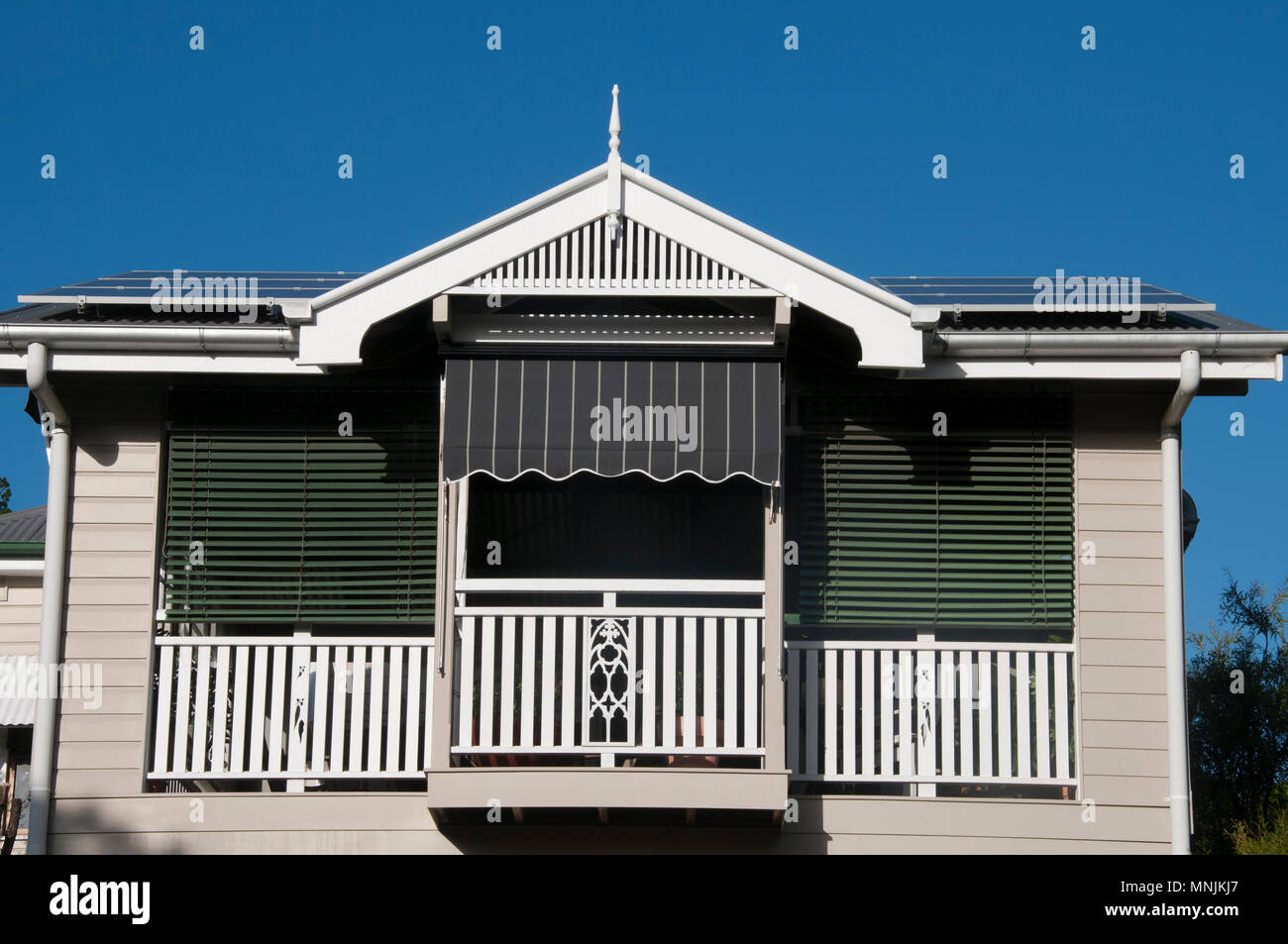 Queenslander-style Art Nouveau timber home ca. 1913, in the inner-city Brisbane  suburb of Windsor, Australia Stock Photo