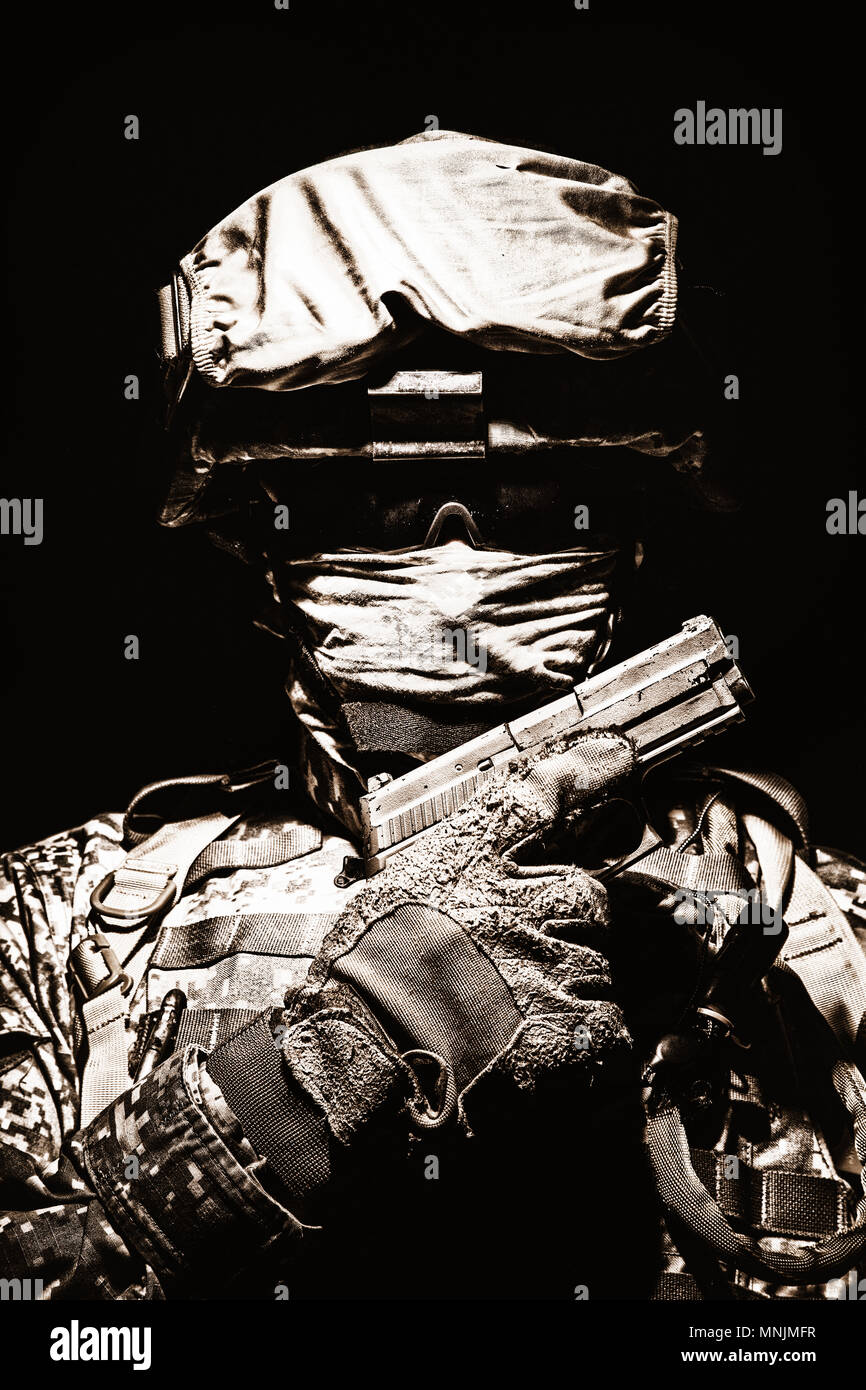 Portrait of commando with service pistol in hand Stock Photo - Alamy