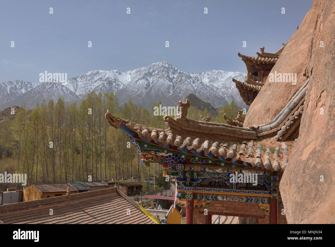 The Mati Si Temples in the Cliff looking out at the Qilian Mountains, Zhangye, Gansu, China Stock Photo