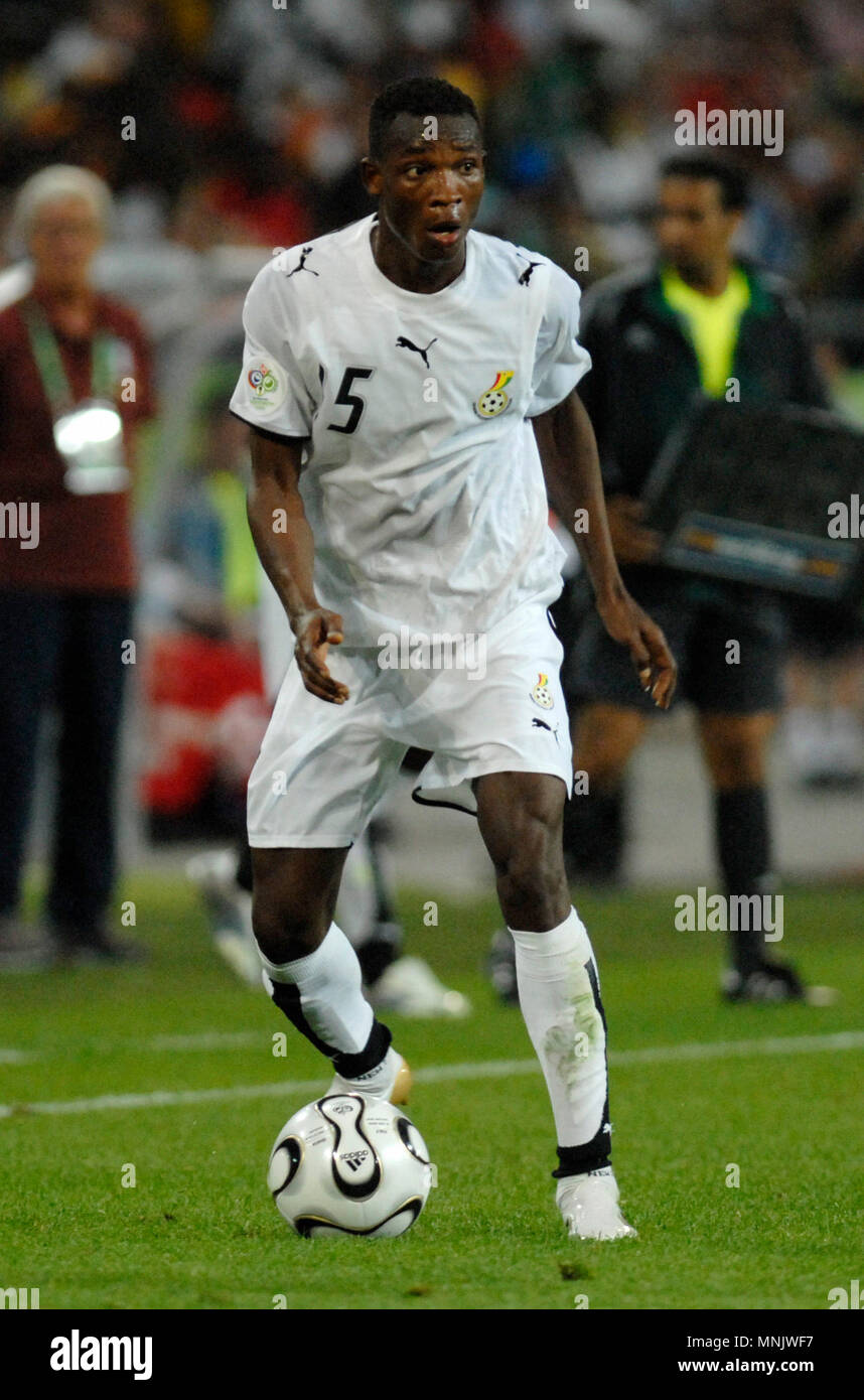 Football:   FIFA World Cup Stadium, Hanover Germany, 12.06.2006, FIFA World Cup Germany 2006 tournament  group matches Group E, Italy (blue)  vs Ghana (white) 2:0 --- John MENSAH (GHA) Stock Photo