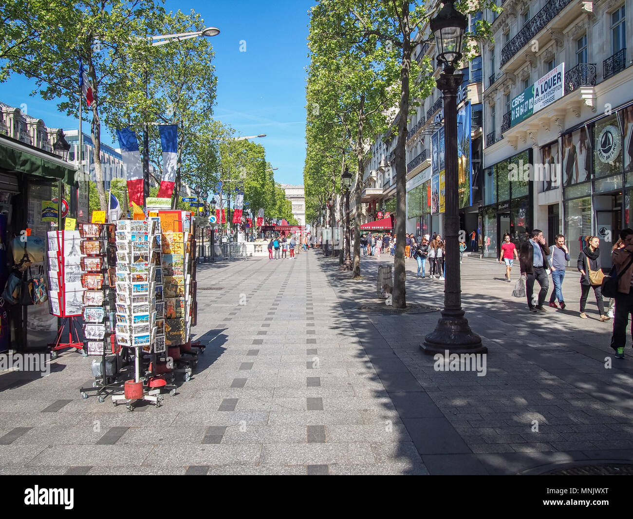 People shopping on the famous street the Avenue des Champs Elysees