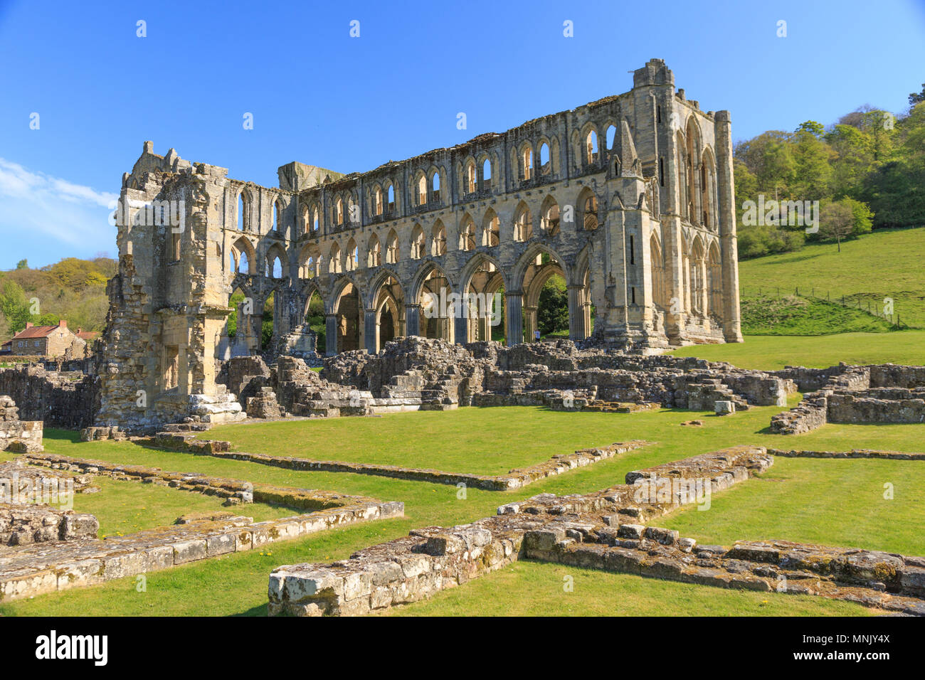 England, North Yorkshire, Rievaulx. 13th c. Cistercian ruins of Rievaulx Abbey. English Heritage  and National Trust Site. Near River Rye. Stock Photo