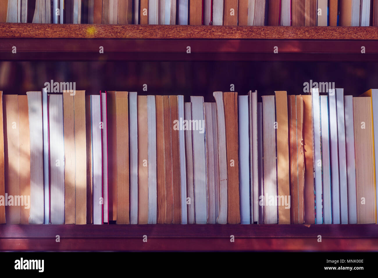 Used books on the bookshelf in library Stock Photo Alamy