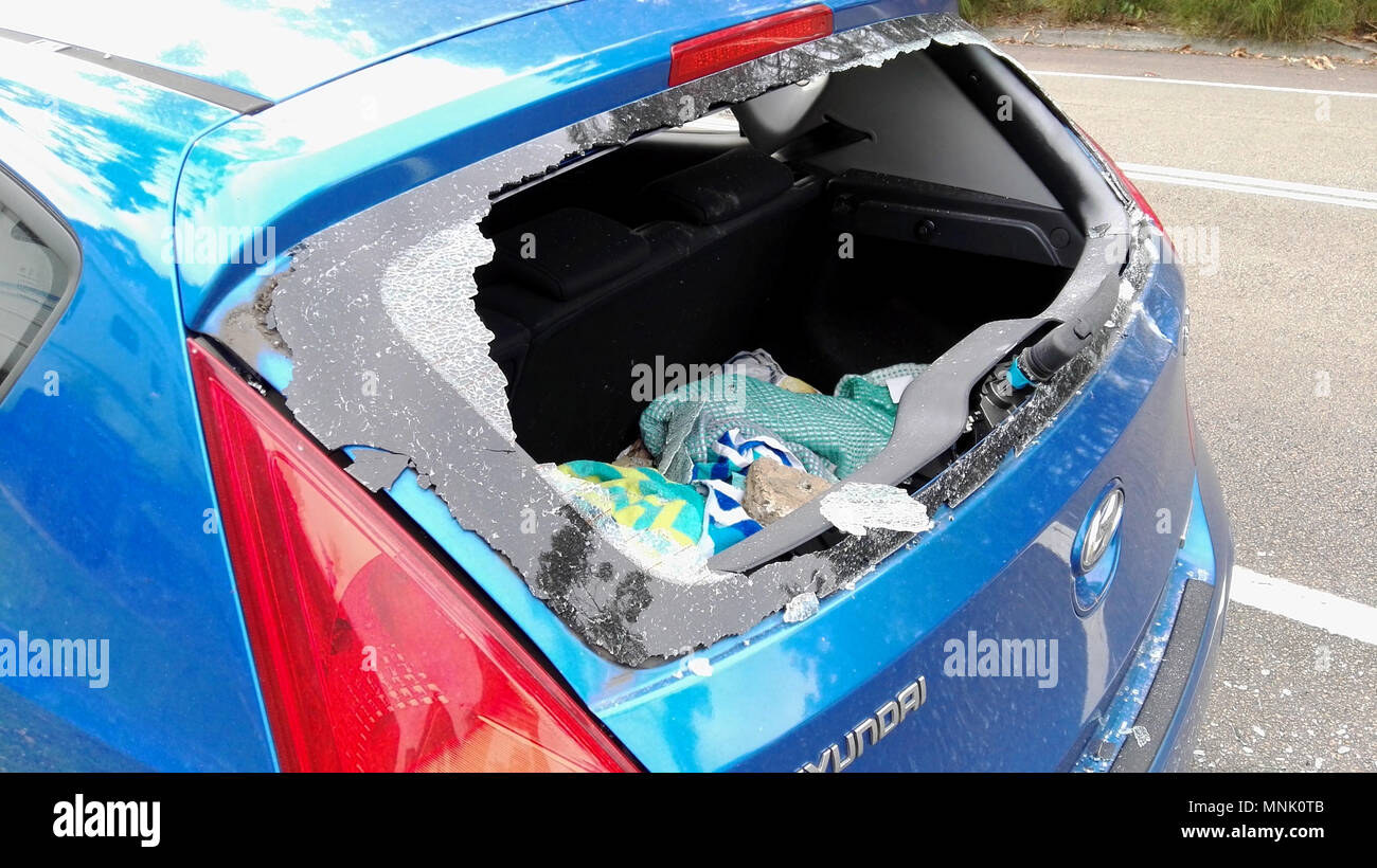 Car with broken rear window Stock Photo Alamy