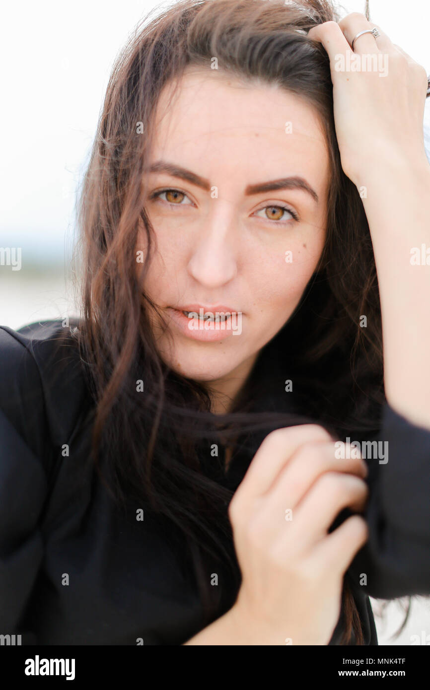 Close Up Of Caucasian Woman Without Makep And Cute Smile Having Black Hair And Brown Close Up Of Caucasian Woman Without Makep And Cute Smile Having Black Hair And Brown