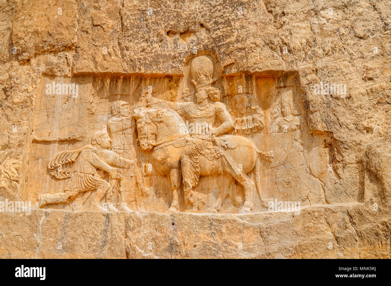 The ancient tombs of Achaemenid dynasty Kings of Persia are carved in rocky cliff in Naqsh-e Rustam, Iran. Stock Photo