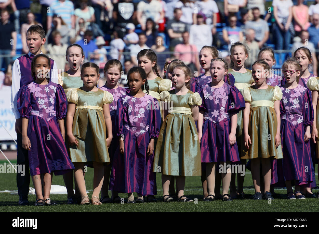 St. Petersburg, Russia - May 12, 2018: Children choir performs the anthem of Russia during opening ceremony of Rugby Europe Sevens Club Champion's Tro Stock Photo