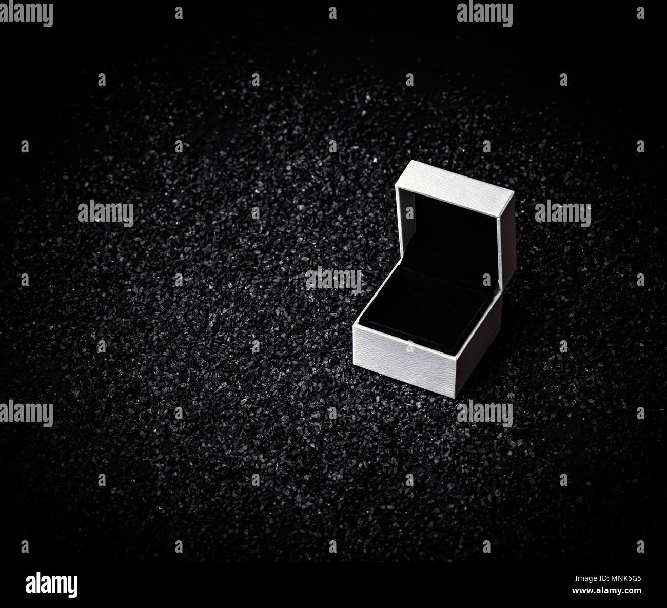Empty white box for ring on a black background Stock Photo