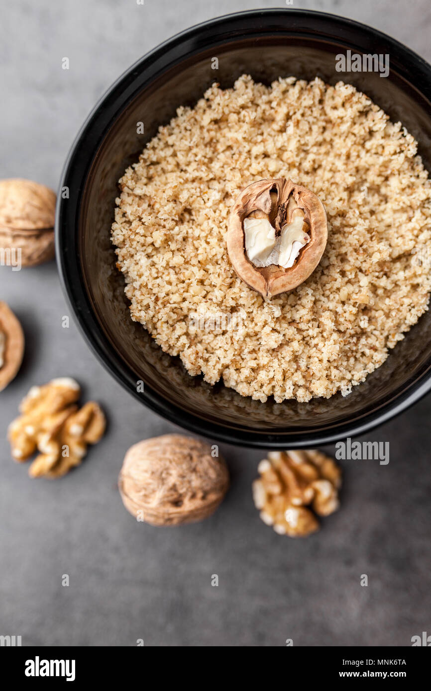 Delicious walnuts on grey rustic background Stock Photo