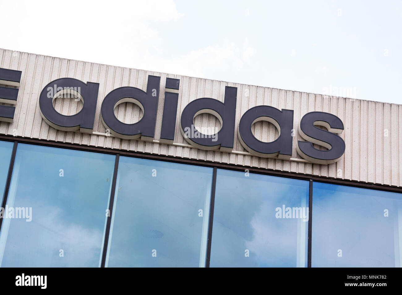 Adidas logo headquarters hi-res stock photography and images - Alamy