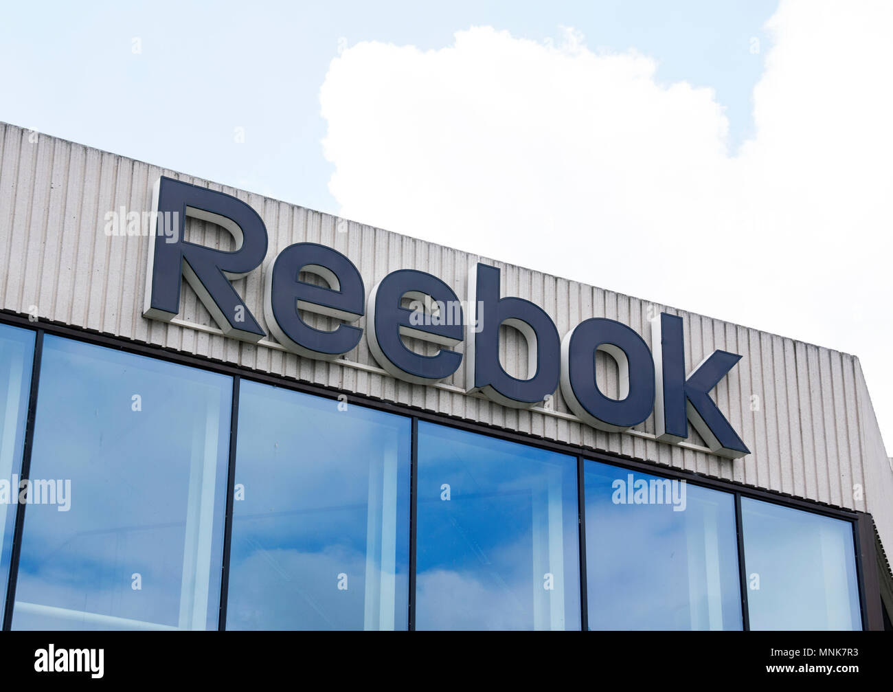 Amsterdam, Netherlands-august 14, 2016: letters reebok on the headquarters  in Amsterdam Stock Photo - Alamy