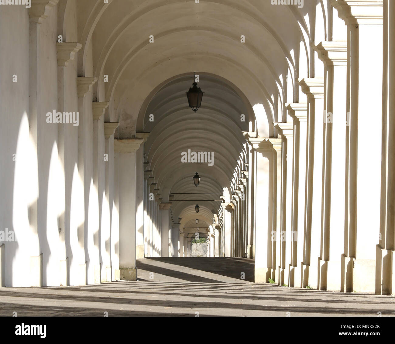 inside a long portico downhill only for pedestrians Stock Photo - Alamy