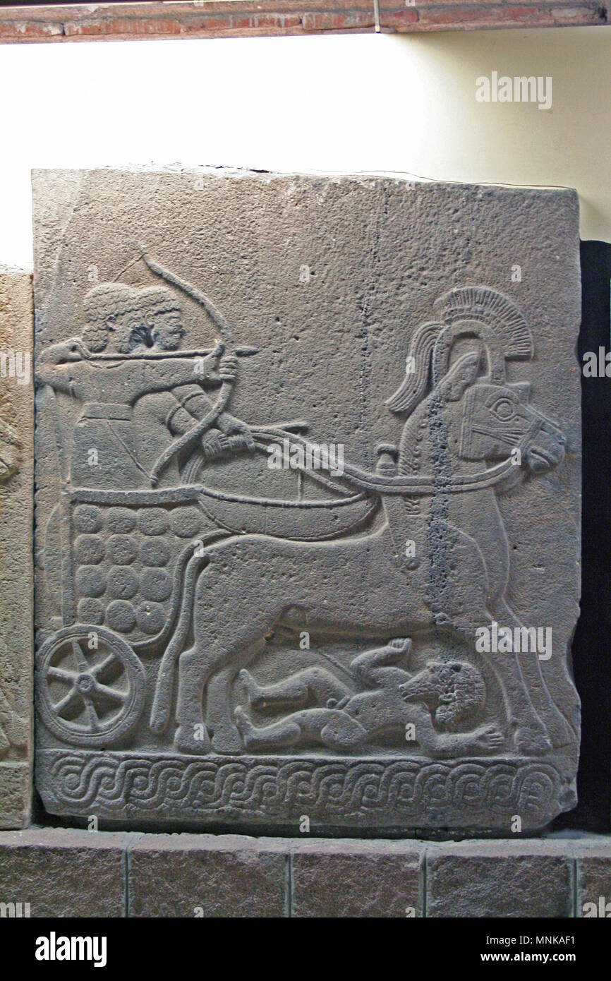 At Ankara, Turkey , On  August/03/2010  - relief with a Hittite War Chariot in the  Museum of Anatolian Civilization, Ankara Stock Photo