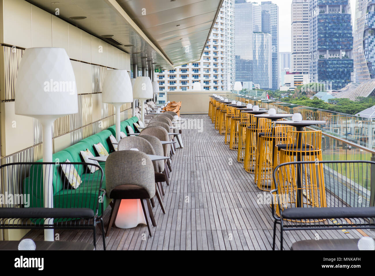 Interior design of an outdoor sky lounge space that offer spectacular skyline of the Marina Bay at National Gallery Singapore. Stock Photo