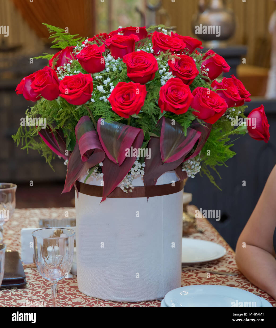 Beautiful red roses in a round box. Stock Photo
