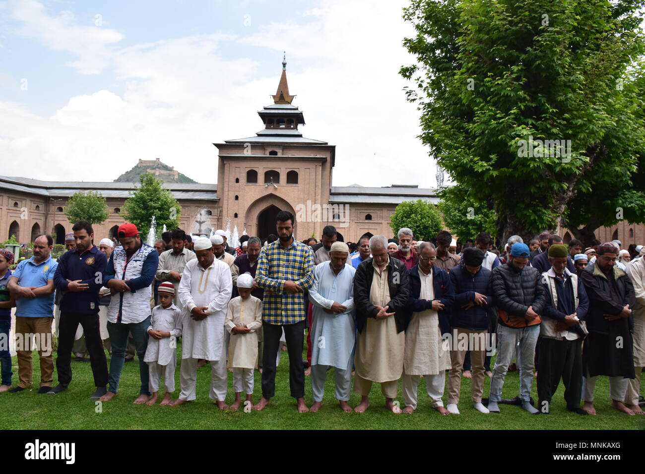 Kashmiri Muslims prays on the first Friday of the holy fasting month of Ramadan in the garden of Jamia Masjid or Grand Mosque. Islam's holiest month of Ramadan is a period of intense prayer, dawn-to-dusk fasting and nightly feasts. Stock Photo