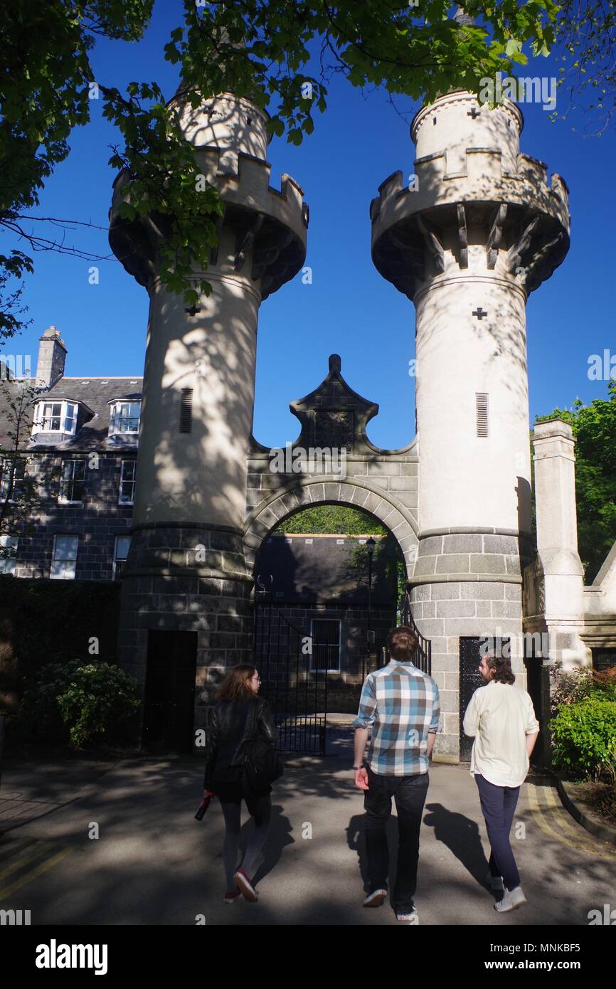 Three University Friends at Powis Gate, White Minarets Towers and Archway. University of Aberdeen, Scotland, UK. May, 2018. Stock Photo