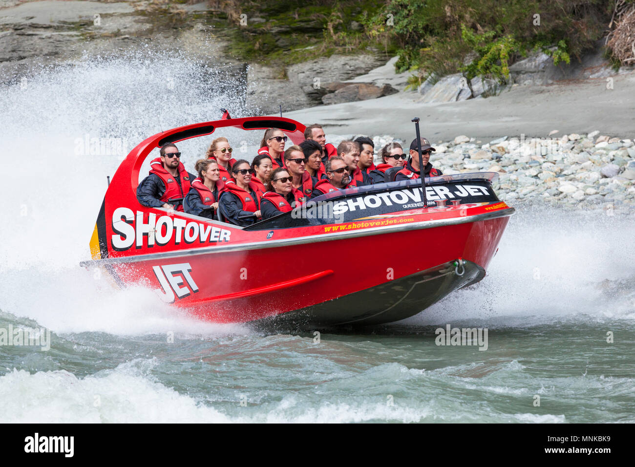 shotover jet boating on the shotover river near queenstown people new zealand New Zealand queenstown New Zealand South Island nz Stock Photo