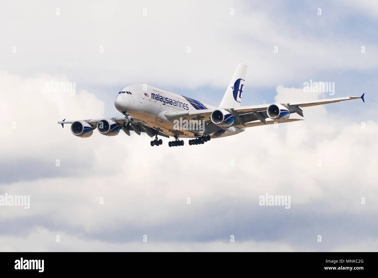 A malaysian airlines airbus a380 plane lands at heathrow airport hires