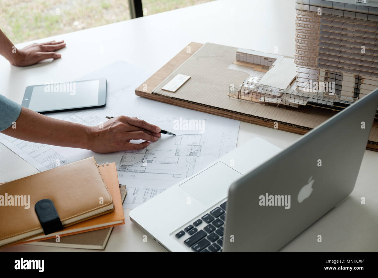 Architect Engineer Design Working on Blueprint Planning Concept. Construction Concept Stock Photo