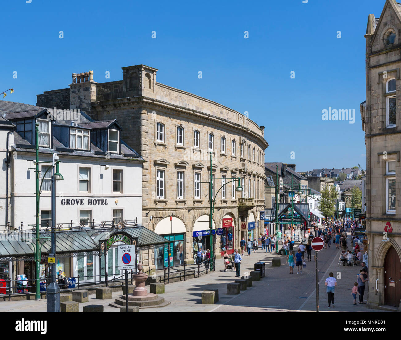Shops on Spring Gardens in the town centre, Buxton, Derbyshire, England, UK Stock Photo