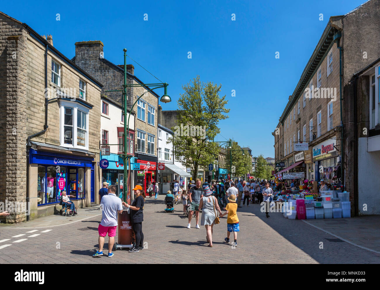 Shops on Spring Gardens in the town centre, Buxton, Derbyshire, England, UK Stock Photo