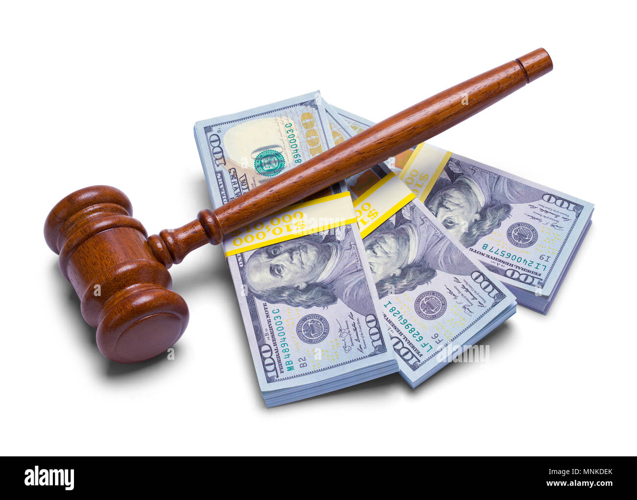 Judges Gavel with Stack of Money Isolated on a White Background. Stock Photo