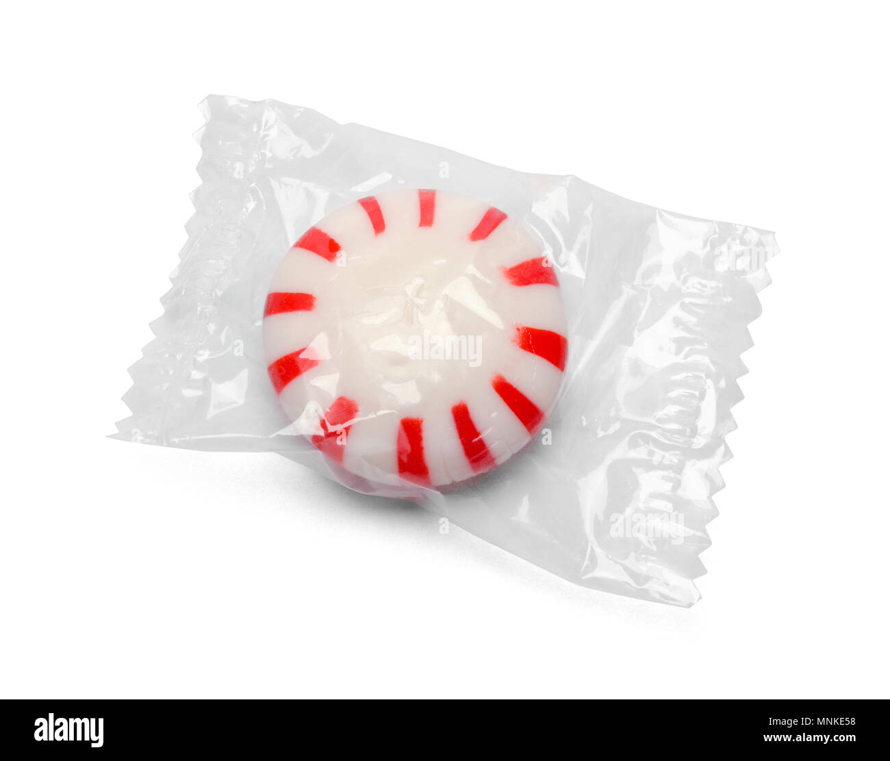 Peppermint Candy in a Plastic Wrapper Isolated on a White Background. Stock Photo