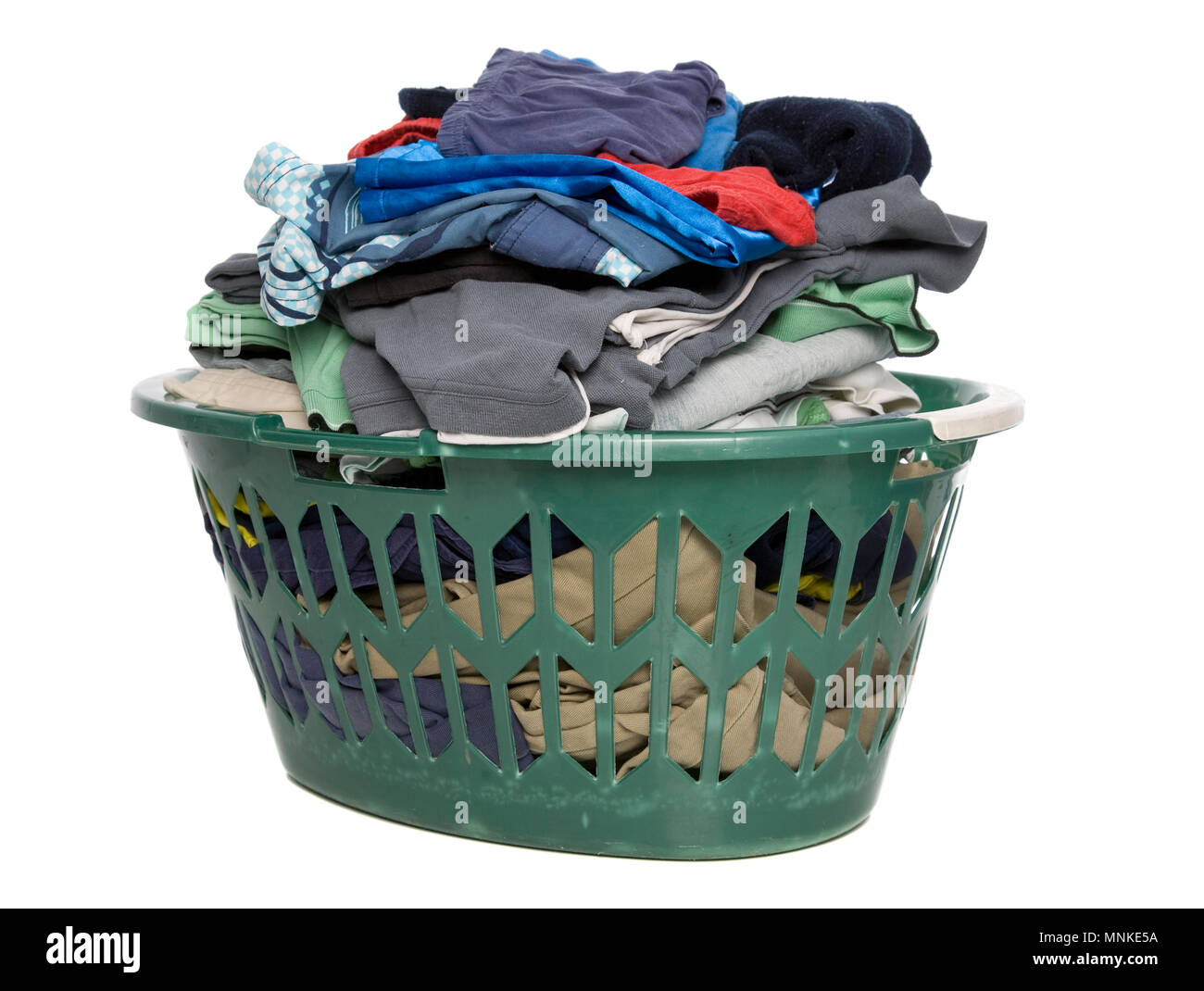 Folded clothing in a washing basket Stock Photo Alamy