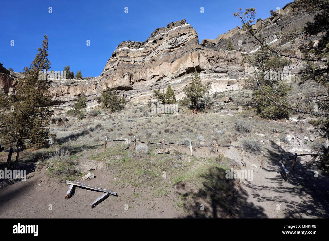 Trail, Rustic Fence and Ridge in the High Desert of Central Oregon Stock Photo