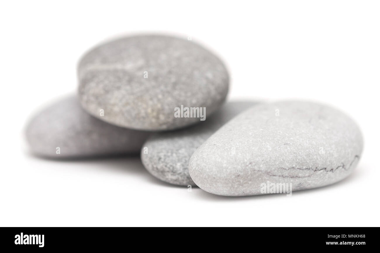 Pile of stones isolated on white background Stock Photo - Alamy