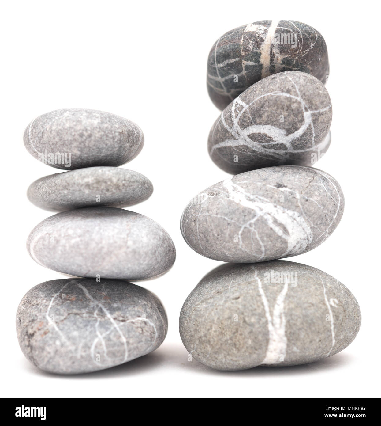 Piles of stones isolated on white background Stock Photo - Alamy