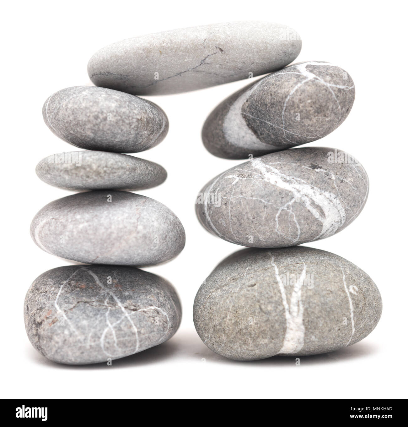 Pile of stones isolated on white background Stock Photo - Alamy