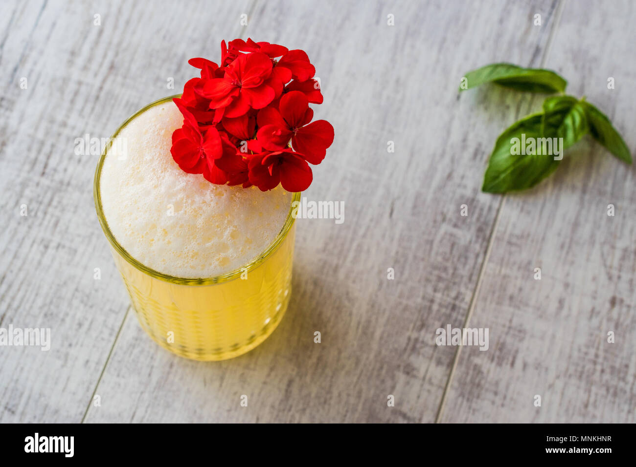 Persian Saffron Milkshake with basil leaves. Traditional Beverage Stock