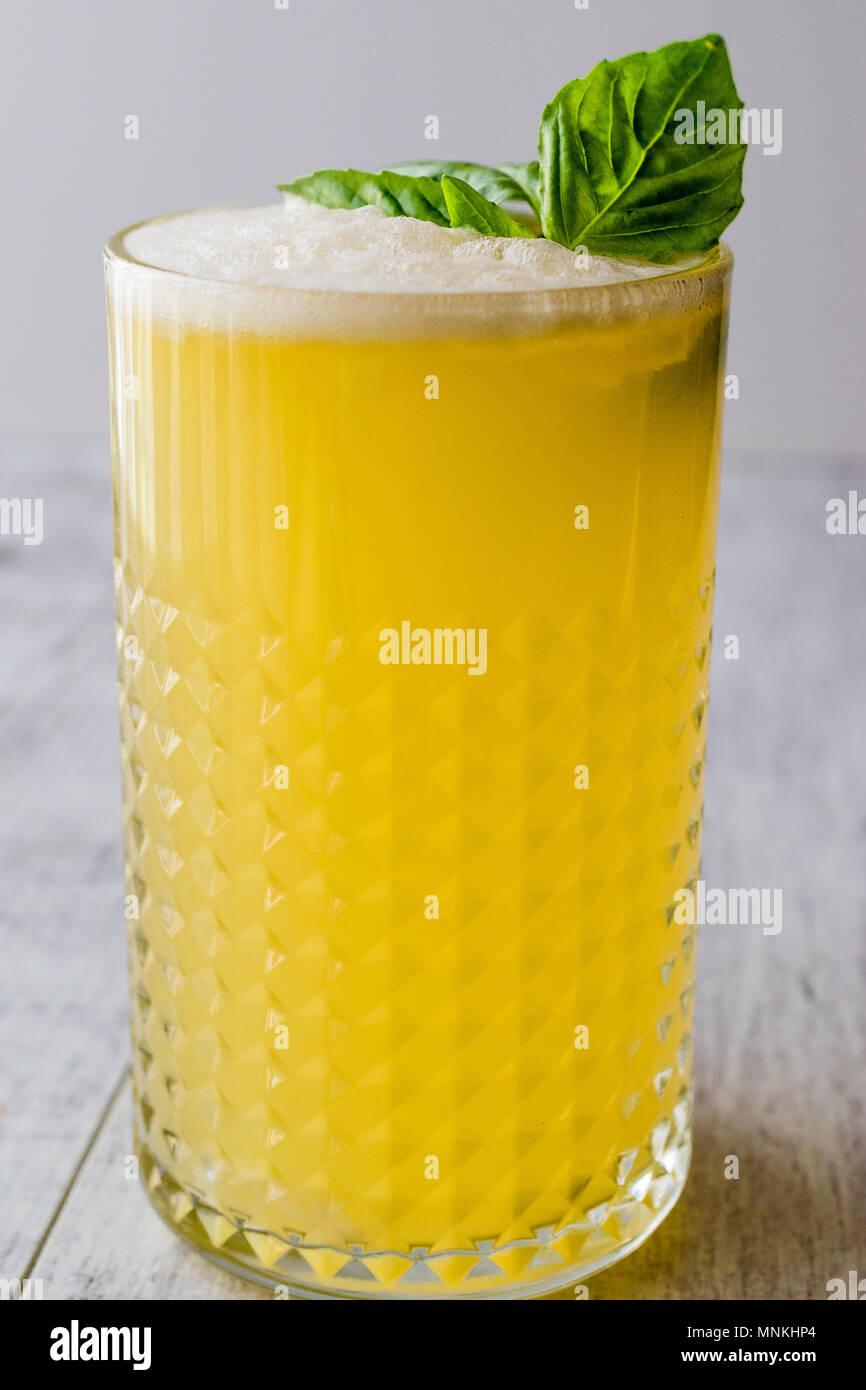 Persian Saffron Milkshake with basil leaves. Traditional Beverage Stock