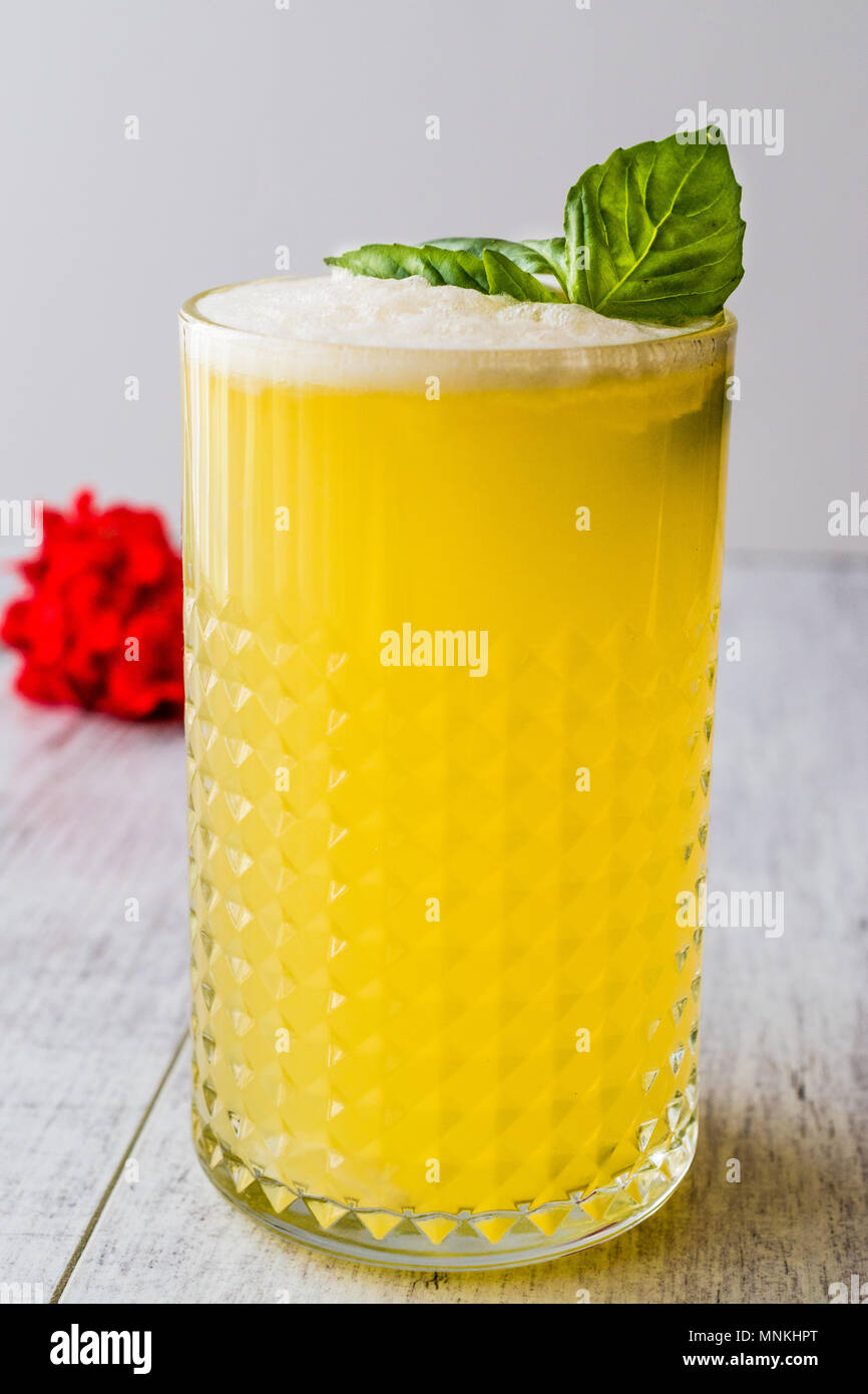 Persian Saffron Milkshake with basil leaves. Traditional Beverage Stock