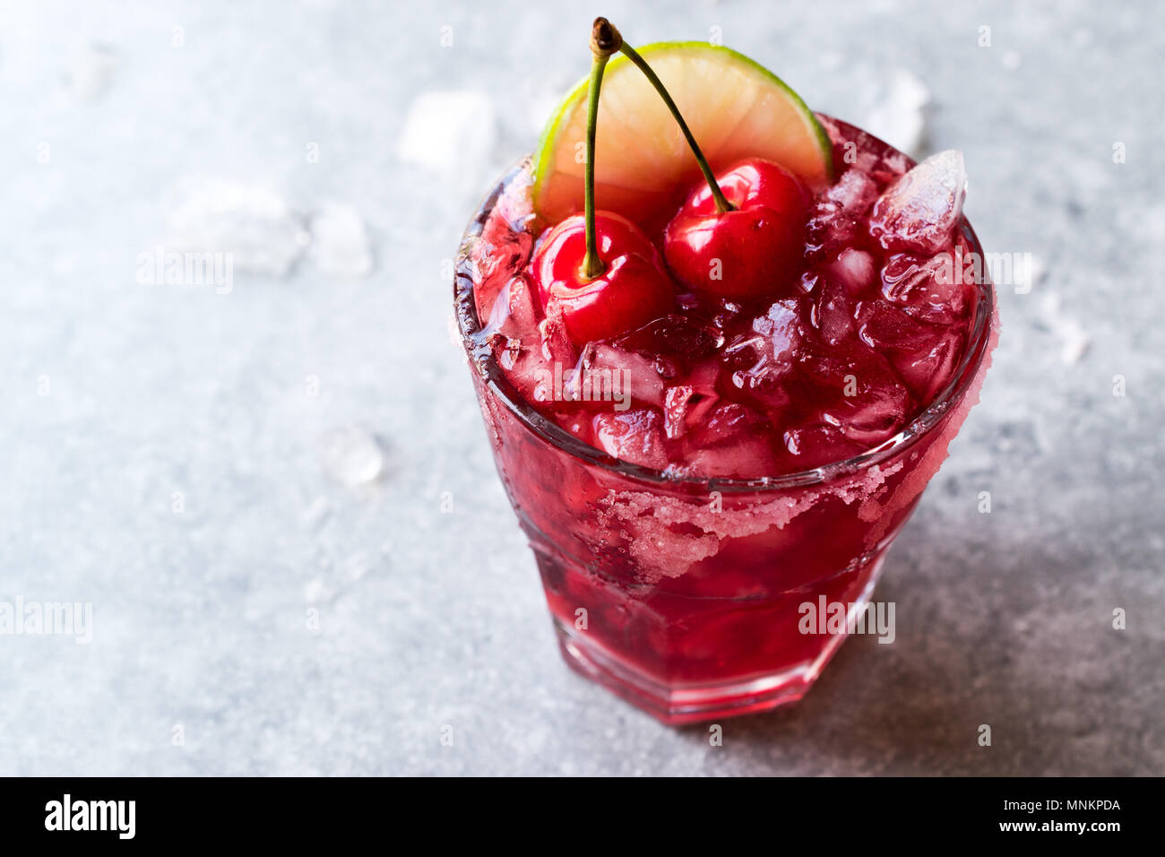 Cherry Margarita Cocktail with Tequila, Lime, Salt, Cherry Juice and