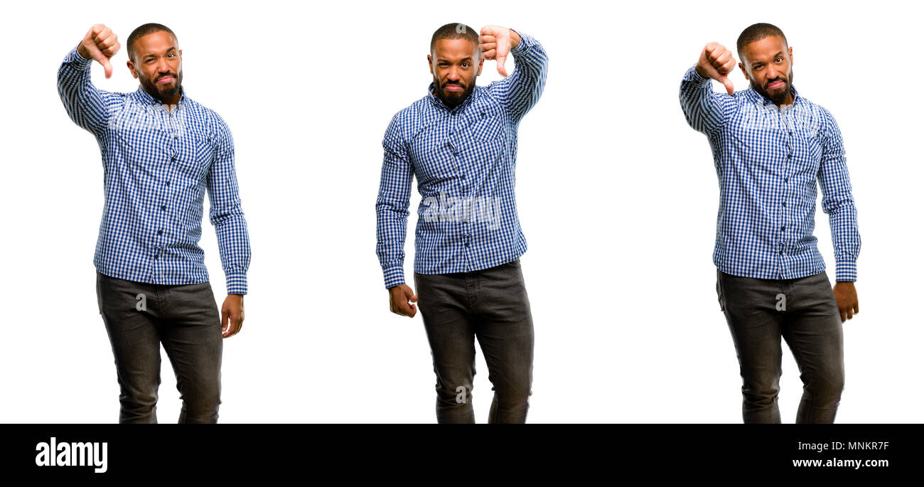 African american man with beard showing thumbs down unhappy sign of ...